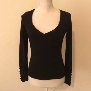 Black top-button detail